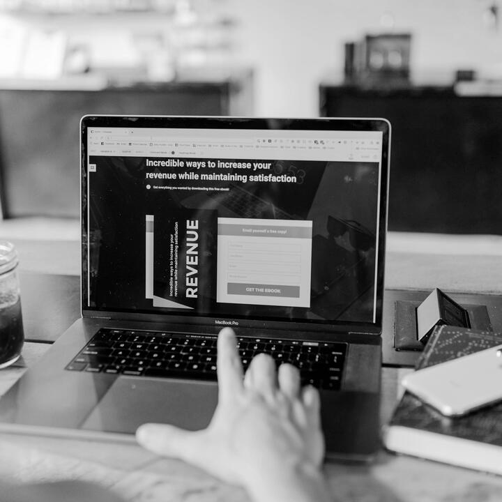 Hand on keyboard of computer